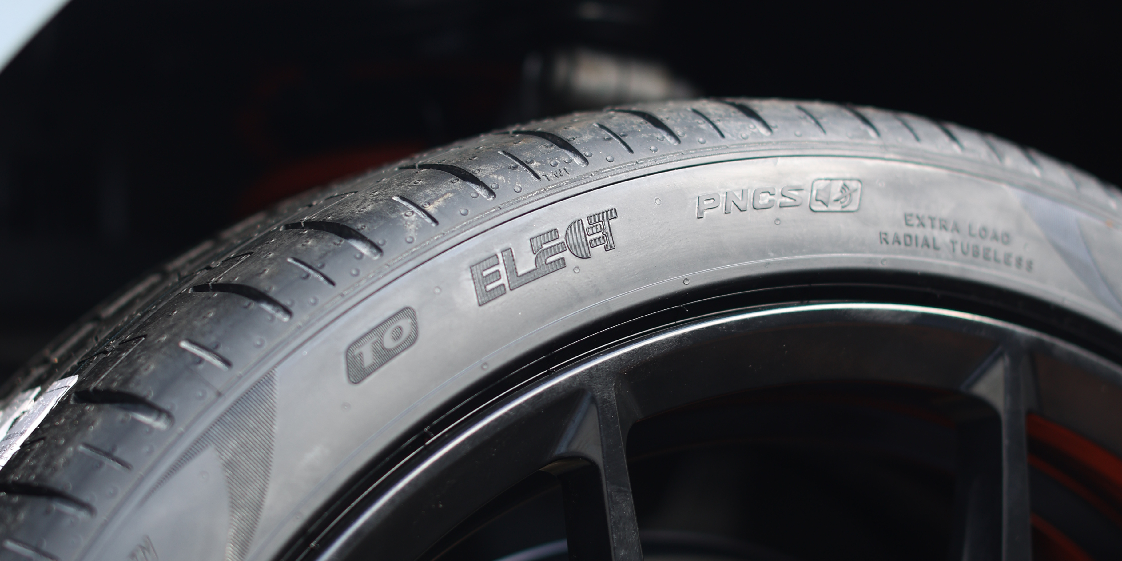 Pirelli tyre sidewall showing EV specific branding logos.