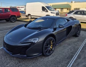  Black McLaren 650S with yellow brake calipers