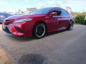  Red Toyota Camry sedan with black alloy wheels