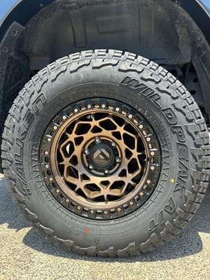 Close-up of bronze Fuel off-road wheel with Falken Wildpeak AT tyre.