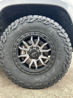  Close-up of ROH alloy wheel wrapped in Mickey Thompson Baja Boss AT tyre.