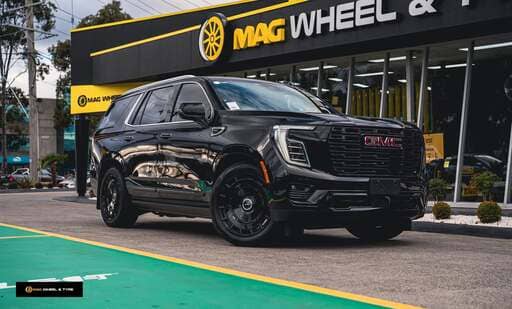  GMC Yukon Denali fitted with 22-inch Vossen HF9 wheels and Pirelli Scorpion tyres.