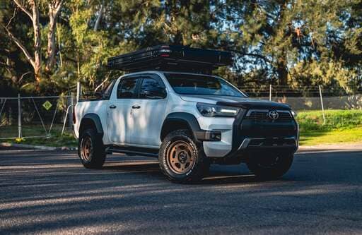  Toyota Hilux fitted with 17-inch RAYS Offroad 05X Matte Gunbronze wheels and BFGoodrich KO3 tyres.