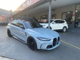  Light blue BMW M3 with black performance wheels parked at Tyres Excel.